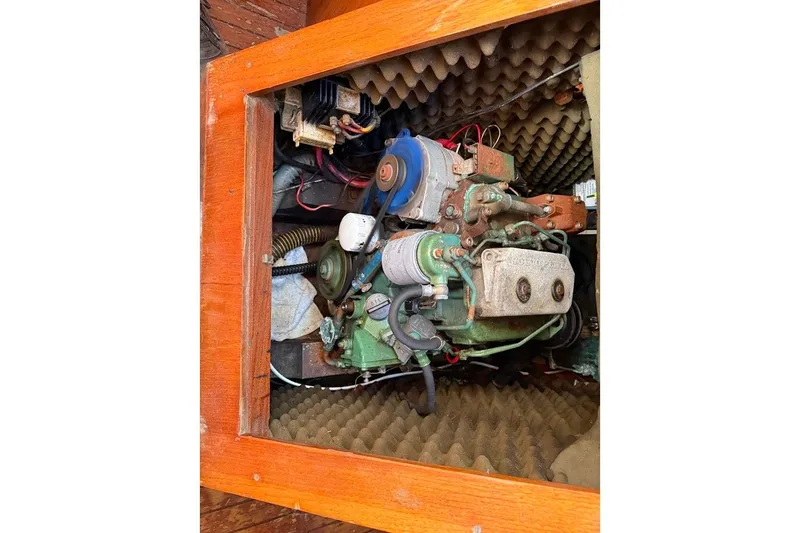 Slide: The Image of Engine compartment of a 1985 Jouet 950 sailboat with soundproofing foam. - 12