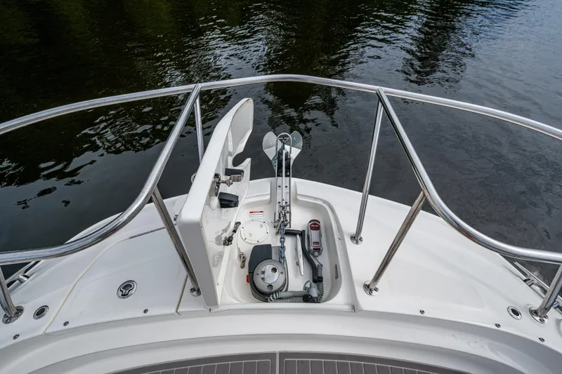 Slide: The Image of 2023 Sea Ray Sundancer 320 Outboard bow with anchor storage, stainless steel railings. - 33