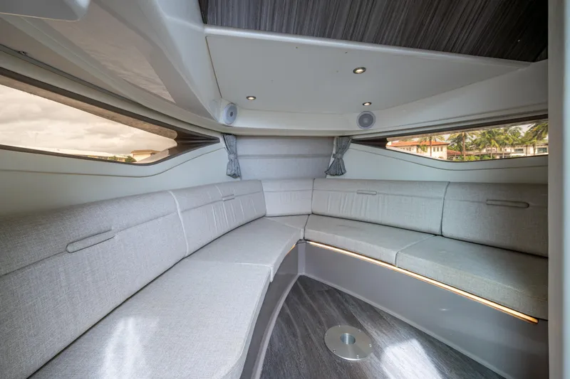 Slide: The Image of Luxurious interior of 2023 Sea Ray Sundancer 320 Outboard with elegant seating and modern design. - 37