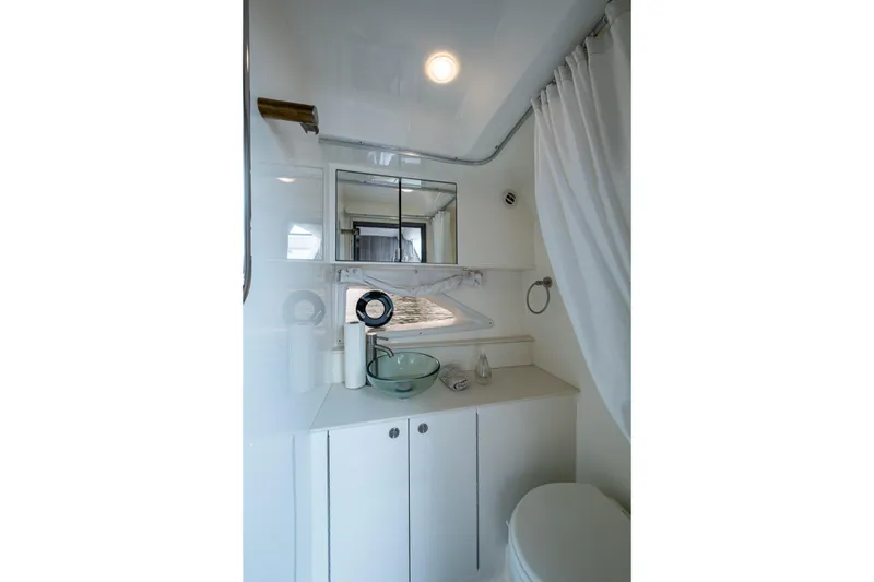 Slide: The Image of 2023 Sea Ray Sundancer 320 Outboard bathroom with modern fixtures and elegant design. - 38