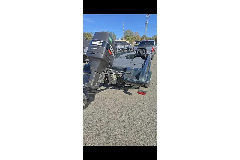 Slide: The Image of 1995 Nitro 170 TF boat with Tracker 125 outboard motor on trailer. - 7