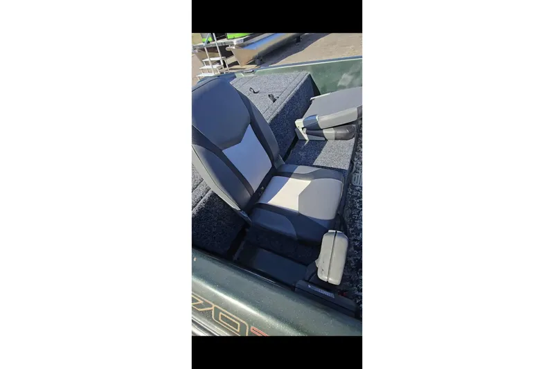 Slide: The Image of 1995 Nitro 170 TF boat seat with gray and black upholstery. - 8