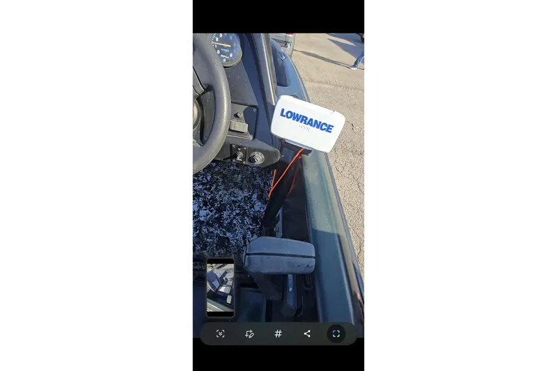 Slide: The Image of 1995 Nitro 170 TF boat dashboard with Lowrance fish finder. - 9