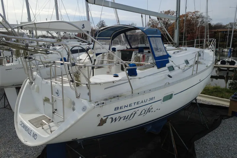 The Image of 2001 Beneteau Oceanis Clipper 361 sailboat docked, featuring white hull and blue accents. - 0