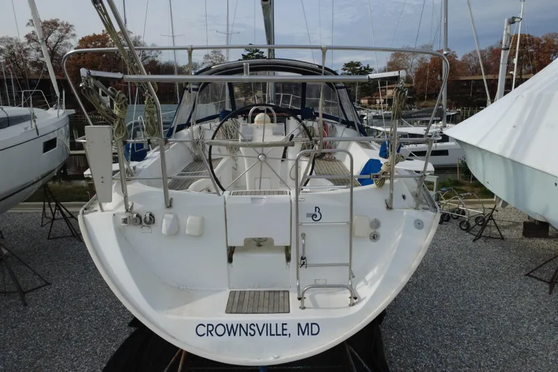 Slide: The Image of 2001 Beneteau Oceanis Clipper 361 sailboat on dry dock, side view. - 7