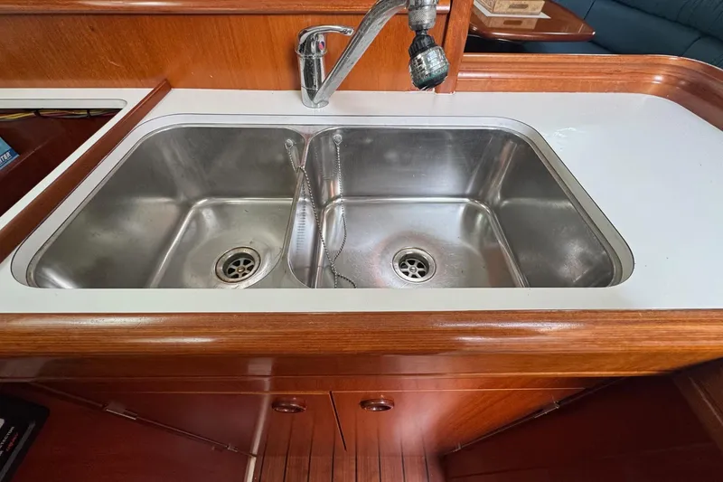 Slide: The Image of Stainless steel double sink in 2001 Beneteau Oceanis Clipper 361 yacht kitchen. - 19