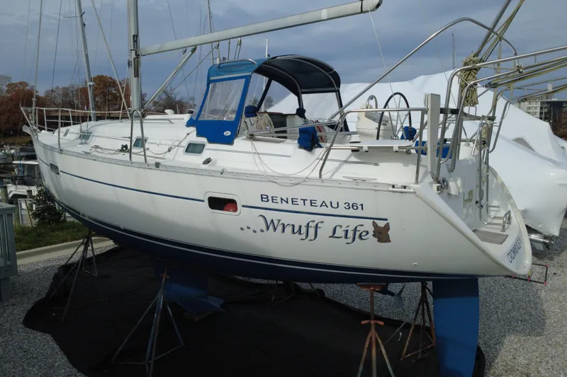Slide: The Image of 2001 Beneteau Oceanis Clipper 361 sailboat on stands, named "Wruff Life." - 3