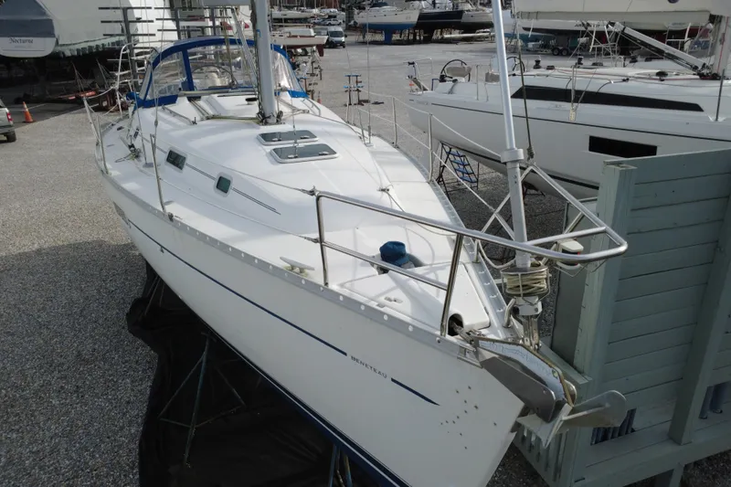 Slide: The Image of 2001 Beneteau Oceanis Clipper 361 sailboat on dry dock, side view. - 6
