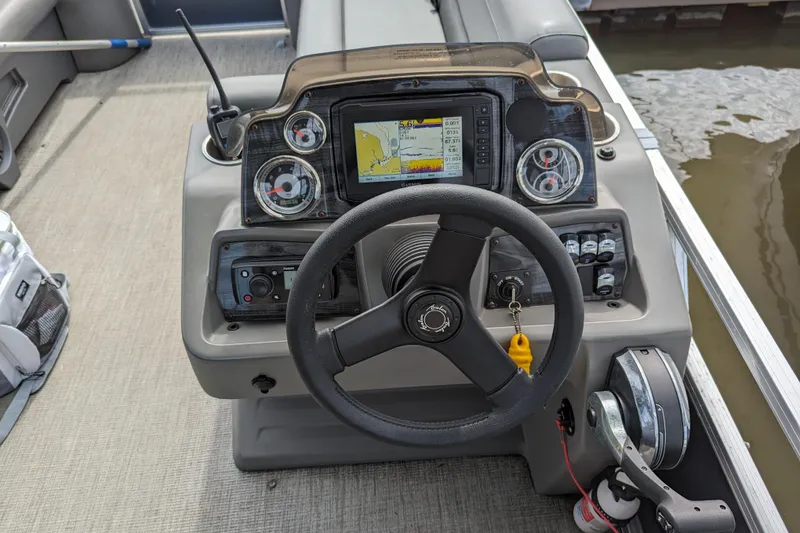 Slide: The Image of 2021 Avalon Catalina Quad Lounger boat near Statue of Liberty on a sunny day. - 6