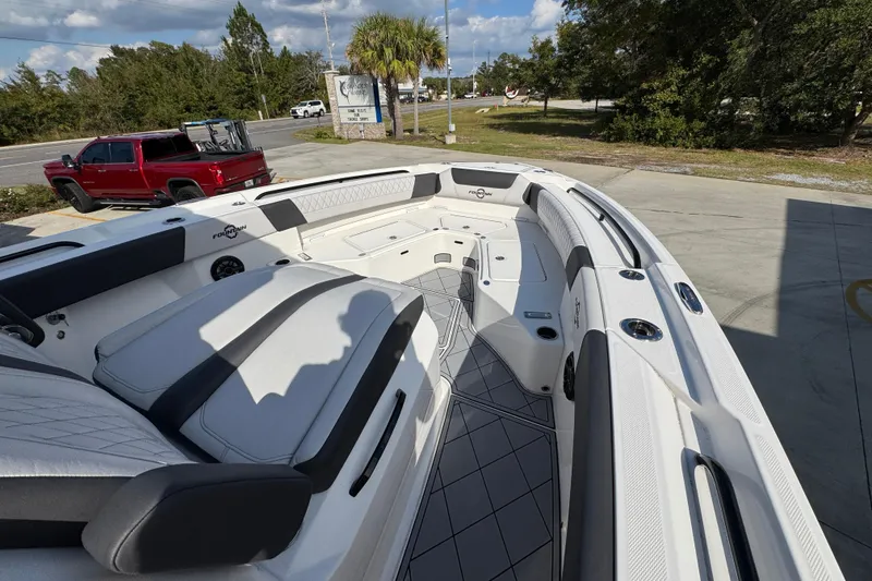 Slide: The Image of 2025 Fountain 32 NX boat interior with sleek seating and modern design. - 15