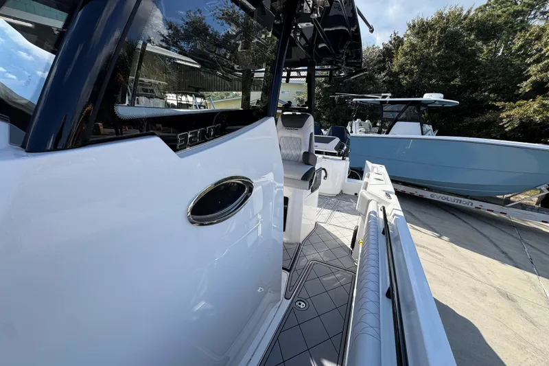Slide: The Image of 2025 Fountain 32 NX boat interior with sleek design and modern seating. - 22