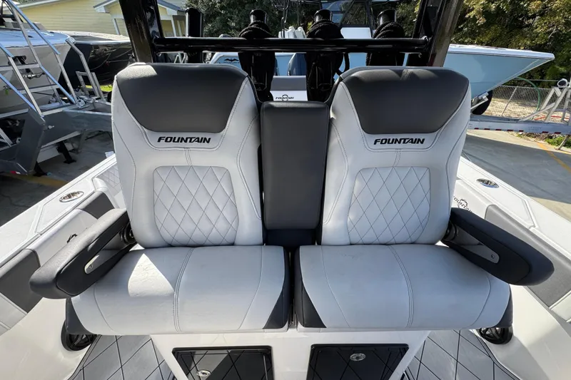 Slide: The Image of Luxury seating on 2025 Fountain 32 NX boat with diamond-stitched upholstery. - 25