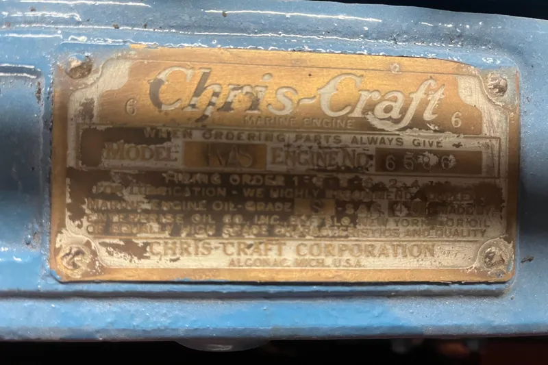Slide: The Image of 1938 Chris-Craft Sportster 25 engine plate, displaying model and engine details. - 18