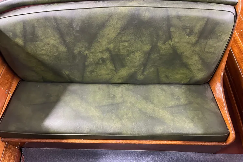 Slide: The Image of Green leather seat in 1938 Chris-Craft 28 Sportsman boat with wooden frame. - 21