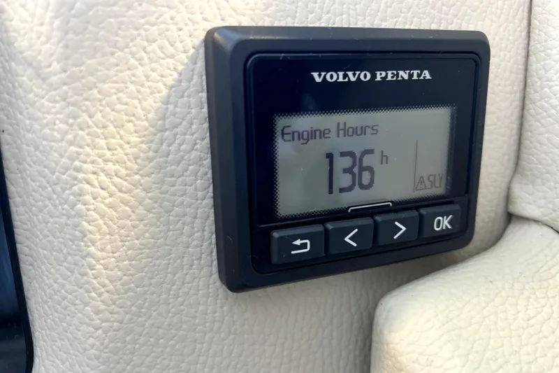 Slide: The Image of Volvo Penta engine hour meter showing 136 hours on 2019 Regal 2800 Bowrider. - 10