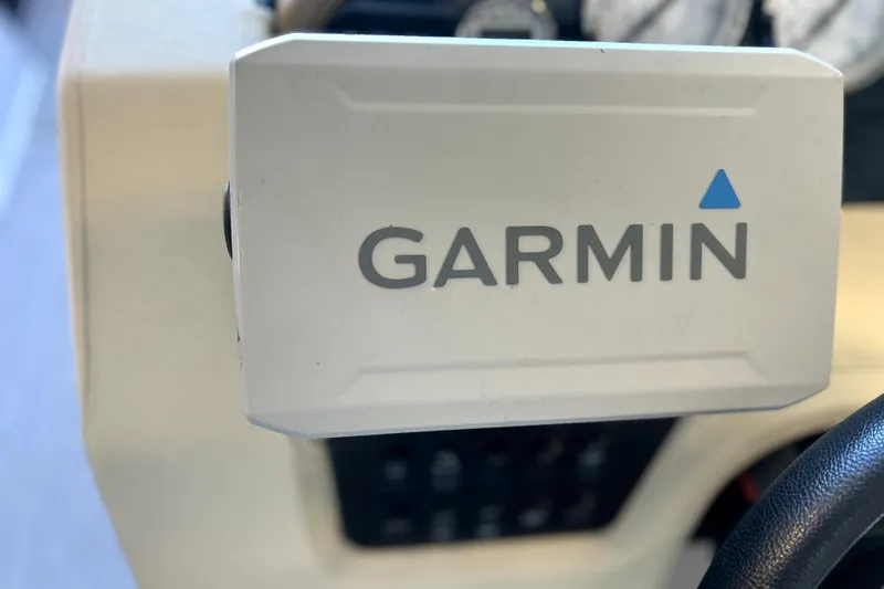 Slide: The Image of Garmin device on 2019 Regal 2800 Bowrider dashboard, close-up view. - 11