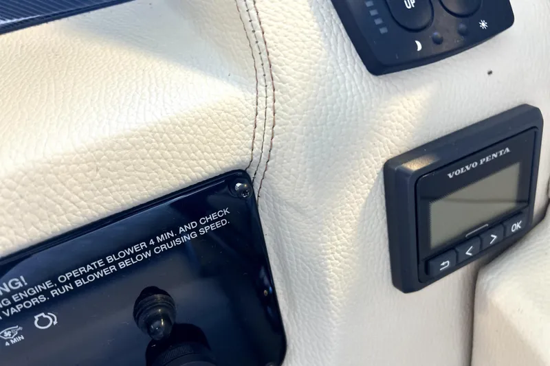 Slide: The Image of Control panel of a 2019 Regal 2800 Bowrider boat with Volvo Penta display. - 16