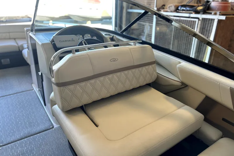 Slide: The Image of 2019 Regal 2800 Bowrider interior with Garmin navigation, luxurious seating, and modern design. - 19