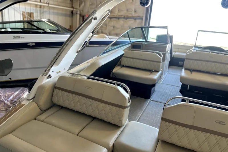 Slide: The Image of 2019 Regal 2800 Bowrider interior with beige seating and modern design. - 25