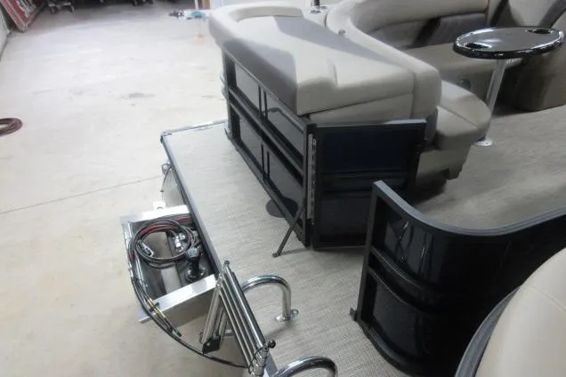 Slide: The Image of 2026 Sylvan Mirage 820 Cruise pontoon boat interior with seating and deck details. - 9