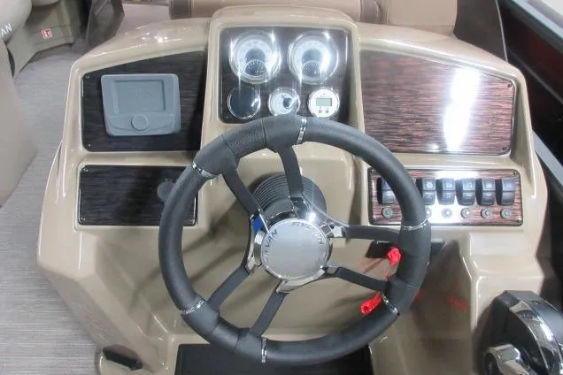 Slide: The Image of 2026 Sylvan Mirage Cruise 822 LZ dashboard with steering wheel and control panel. - 5