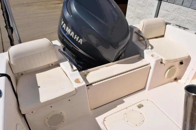 Slide: The Image of 2010 Grady-White Fisherman 209 boat with Yamaha outboard motor and cushioned seating. - 10