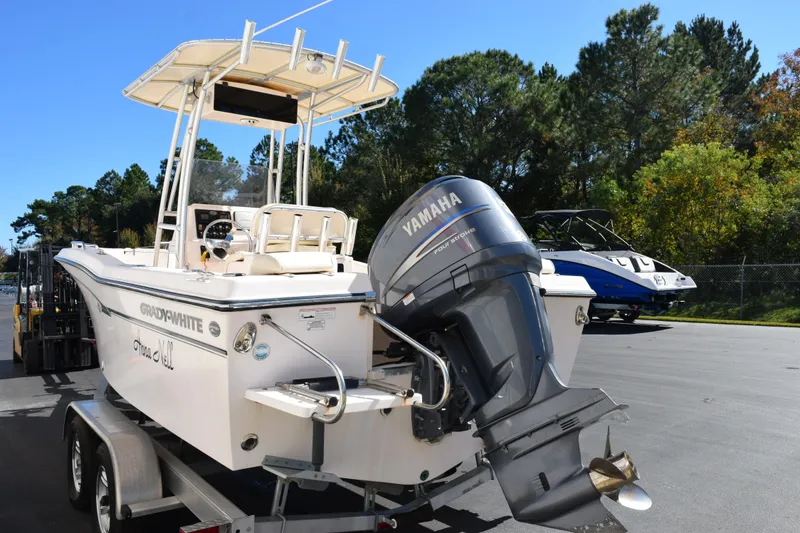 Slide: The Image of 2010 Grady-White Fisherman 209 boat with Yamaha engine on trailer, outdoors. - 7