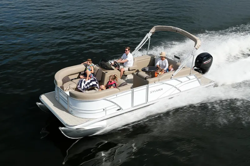 Slide: The Image of 2026 Sylvan Mirage 822 CLZ interior with modern helm and comfortable seating. - 2