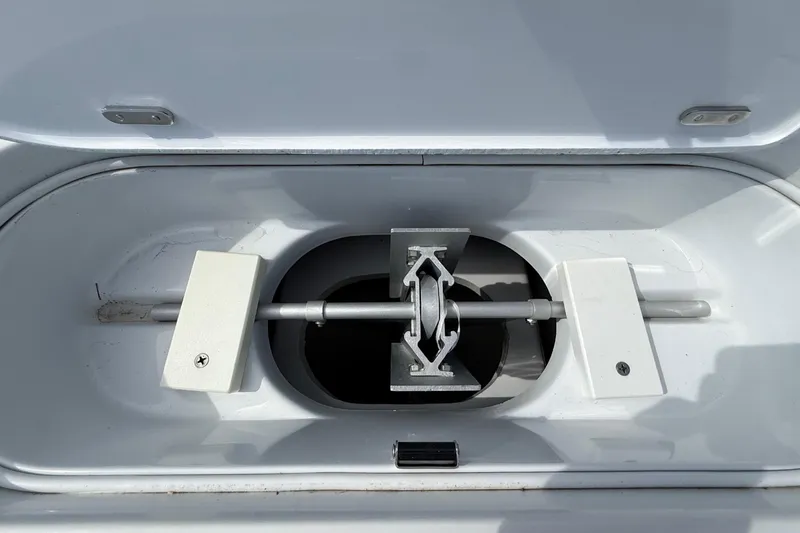 Slide: The Image of 2018 Yellowfin 32 Offshore boat compartment with metal latch mechanism. - 21