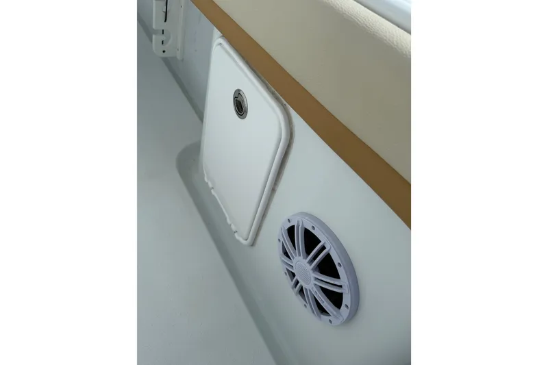Slide: The Image of 2018 Yellowfin 32 Offshore boat interior with speaker and storage compartment. - 43