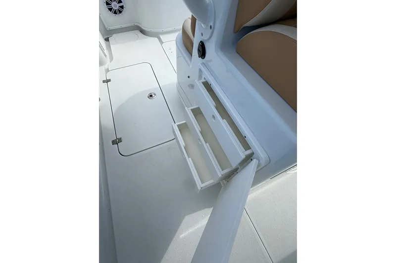 Slide: The Image of 2018 Yellowfin 32 Offshore boat interior with open storage compartments. - 48