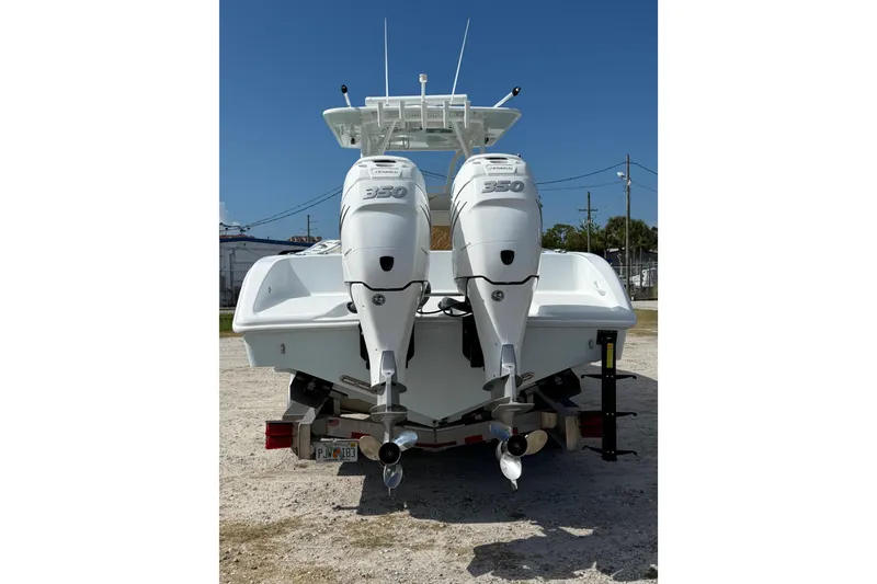 Slide: The Image of 2018 Yellowfin 32 Offshore boat with twin 350 engines, rear view. - 5
