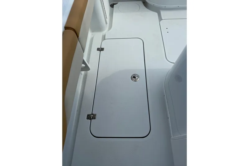 Slide: The Image of 2018 Yellowfin 32 Offshore boat deck with storage compartment. - 60