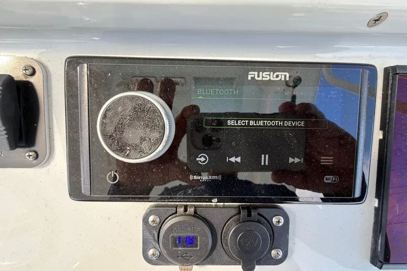 Slide: The Image of Fusion Bluetooth stereo system on 2018 Yellowfin 32 Offshore boat dashboard. - 78