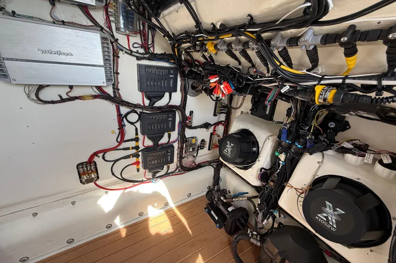 Slide: The Image of Electrical system of a 2018 Yellowfin 32 Offshore boat, featuring wiring and components. - 90