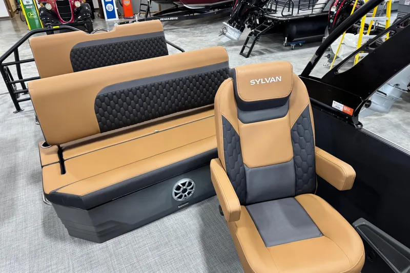 Slide: The Image of 2026 Sylvan L5 DLZ Platinum boat seats in tan and black upholstery. - 14