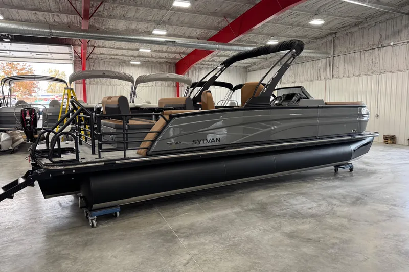 Slide: The Image of 2026 Sylvan L5 DLZ Platinum pontoon boat in a showroom setting. - 3