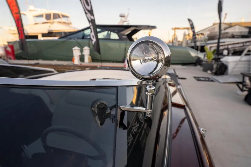 Slide: The Image of Close-up of 2026 Riva 33' Aquariva Special spotlight at a marina. - 22