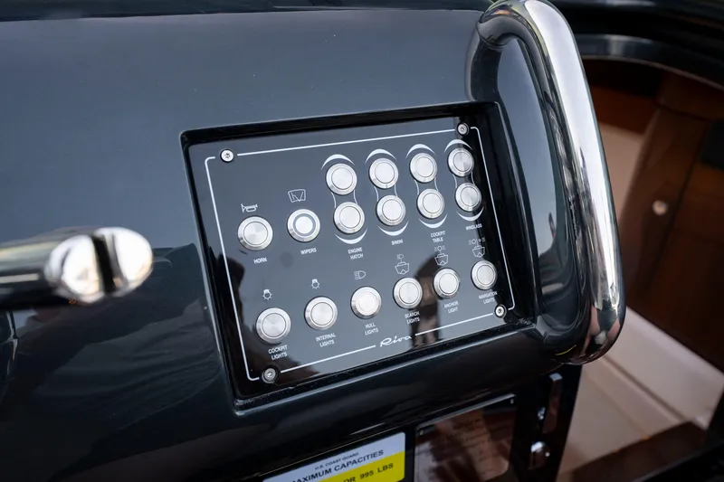 Slide: The Image of Control panel of 2026 Riva 33' Aquariva Special yacht with various buttons. - 27