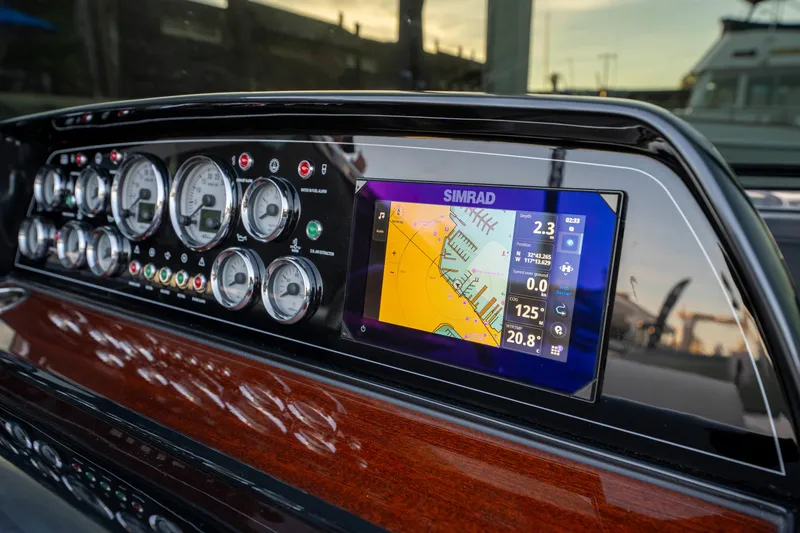 Slide: The Image of Dashboard of 2026 Riva 33' Aquariva Special with navigation display and gauges. - 28