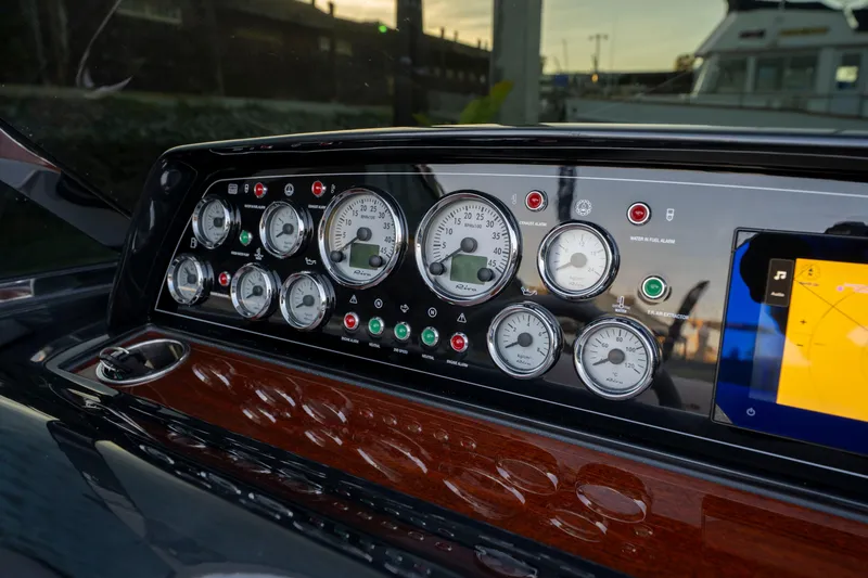 Slide: The Image of Dashboard of 2026 Riva 33' Aquariva Special with gauges and navigation screen. - 29