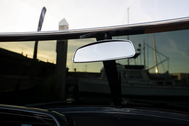 Slide: The Image of Rearview mirror of 2026 Riva 33' Aquariva Special boat at sunset. - 30