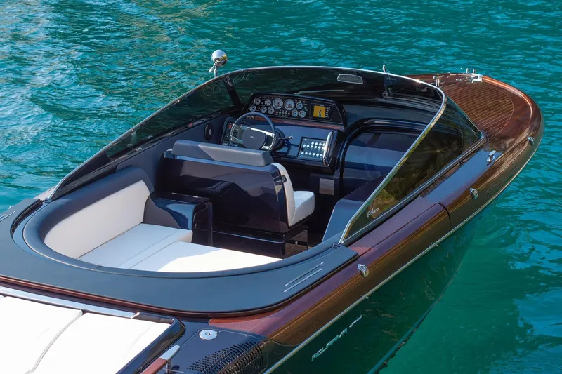 Slide: The Image of 2026 Riva 33 Aquariva Special luxury boat interior on turquoise water. - 4