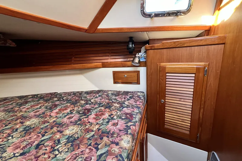 Slide: The Image of 1997 Pacific Seacraft 40 "Serenade" forward cabin starboard hanging locker - 17