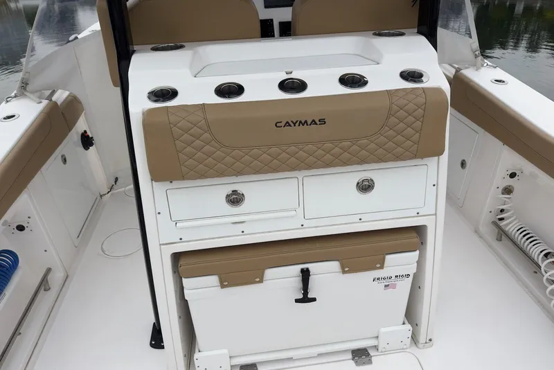 Slide: The Image of 2023 Caymas 341 CC boat interior with storage and seating features. - 14