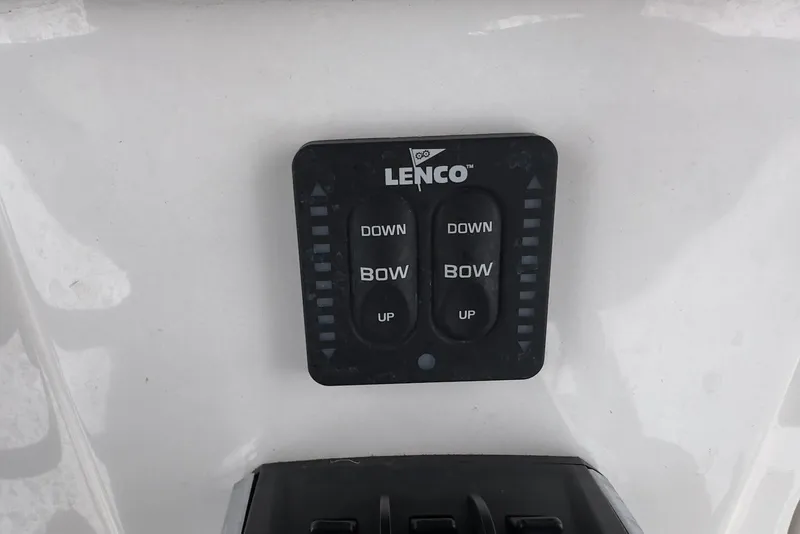 Slide: The Image of Lenco trim tab control panel on 2023 Caymas 341 CC boat. - 21