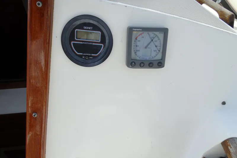 Slide: The Image of Catalina MKII 1988 boat dashboard with Signet knotlog and Raymarine wind gauge. - 23