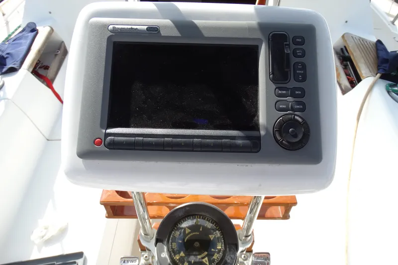 Slide: The Image of Navigation system and compass on a 1988 Catalina MKll sailboat. - 26