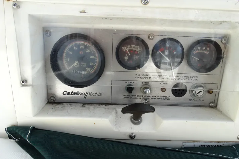 Slide: The Image of Instrument panel of a 1988 Catalina MKII yacht with gauges and controls. - 28