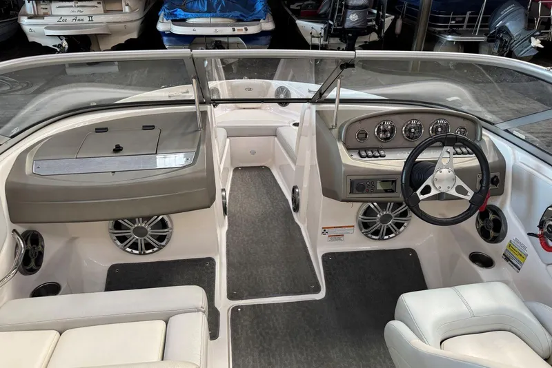 Slide: The Image of 2014 Regal 1900 ES Bowrider interior with steering wheel and dashboard controls. - 15